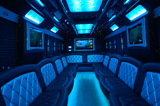 flat-tv screens in our luxurious limo bus